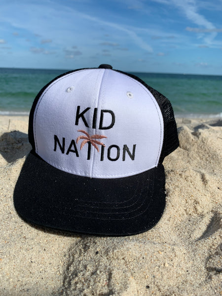 Kid Nation Trucker Hat in black and white